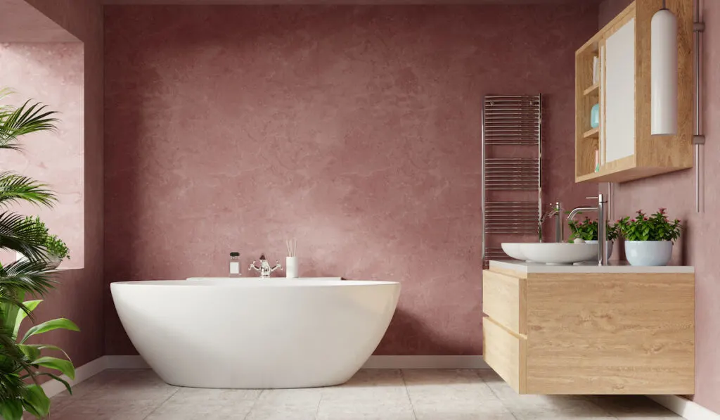 red themed bathroom with bathtub