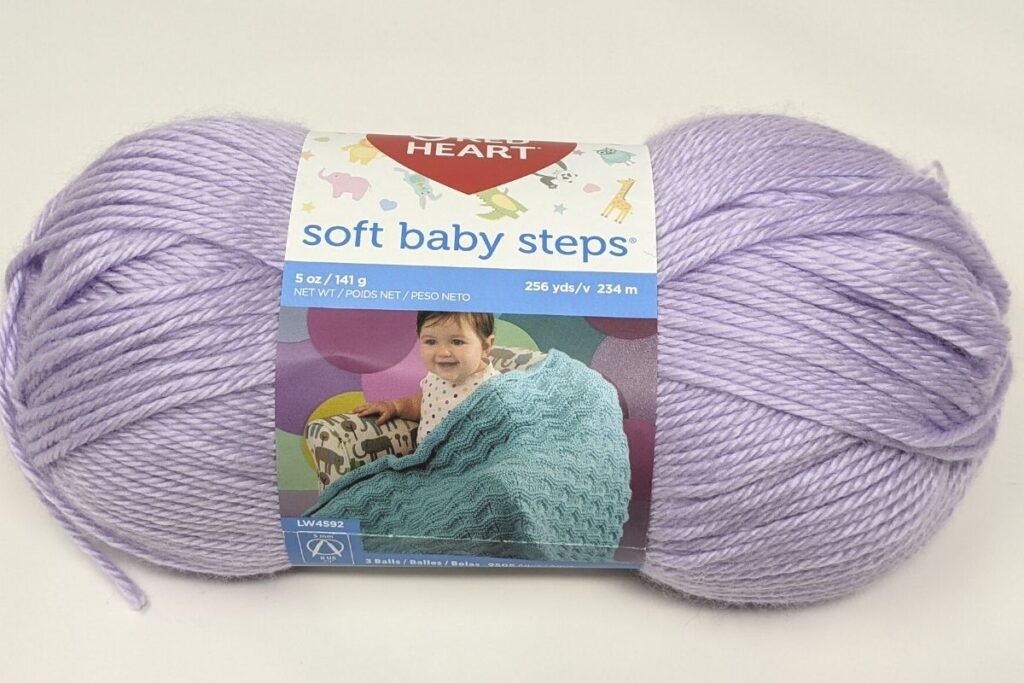 single skein of red heart soft baby steps in lavender