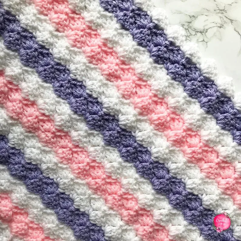 close up photo of crochet stiped banket