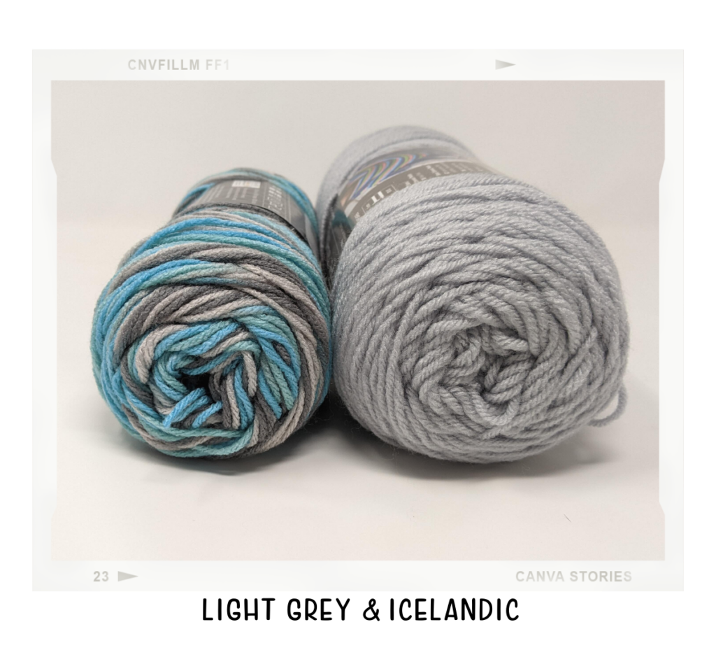 icelandic and light grey yarn on a white table
