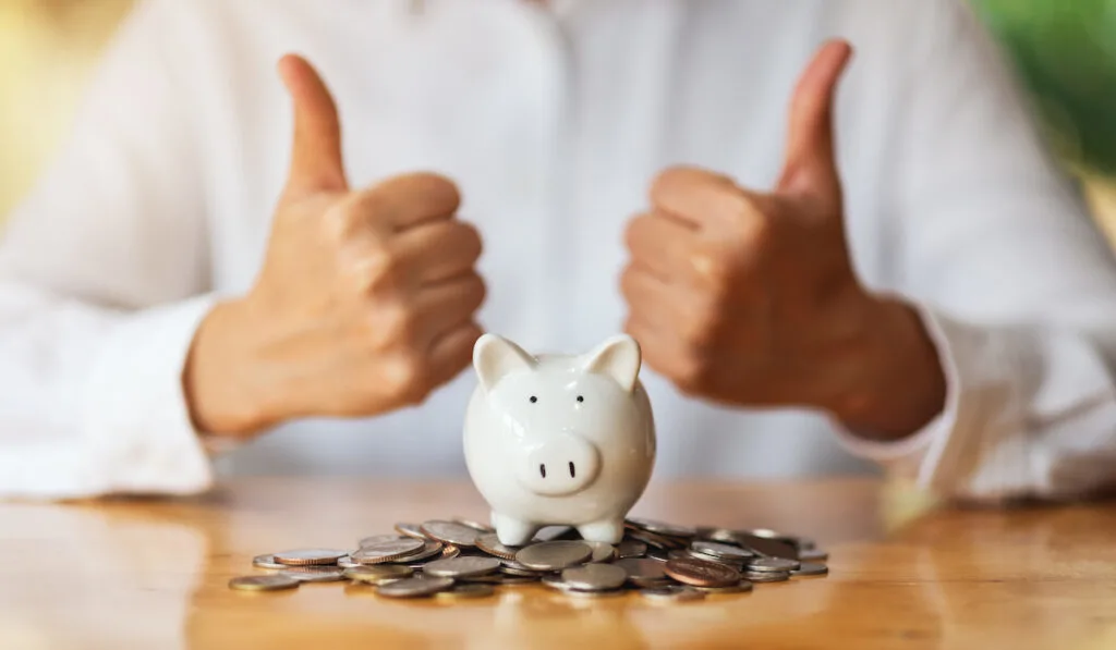 thumbs up piggy bank -