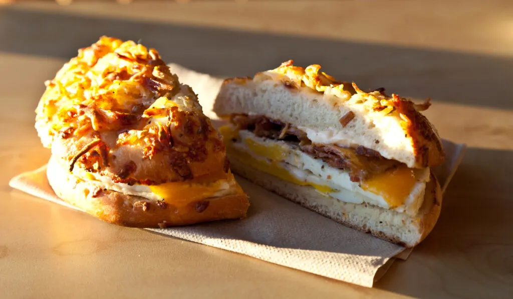 Sausage and egg on hash brown bagel. Breakfast bagel