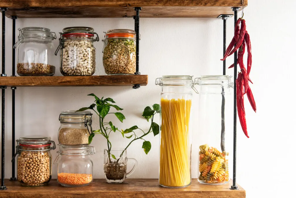 dried food in different style of jars on shelve