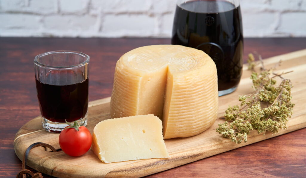 hard Caprino cheese with wine 