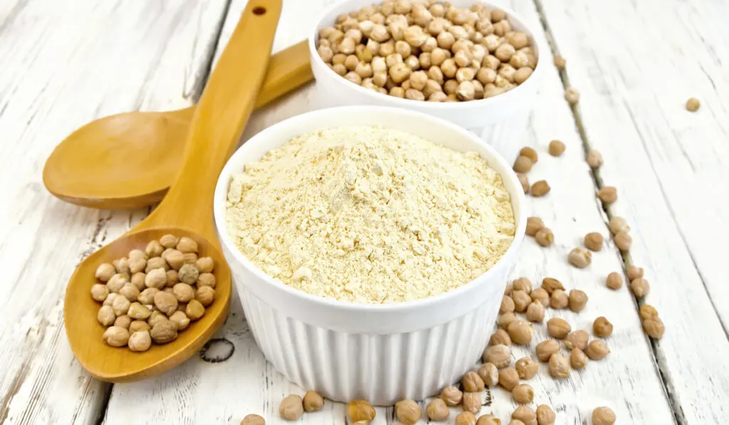 Chickpea and Chickpea Flour in bowl on white background 