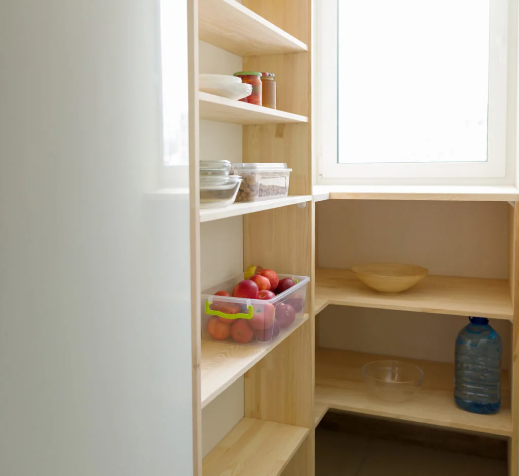 Food storage, wooden shelves in the pantry, kitchen utensils