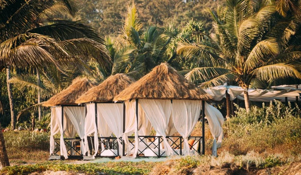 three gazebos in an open space