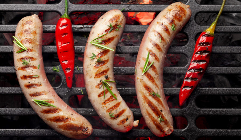 Grilled sausages and chilis 