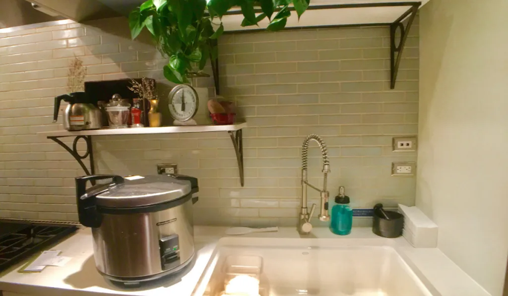 Kitchen sink and counter in restaurant kitchen
