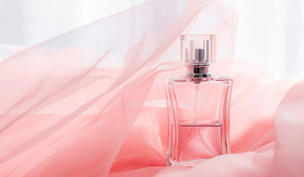 Perfume bottle in organza pink fabric 