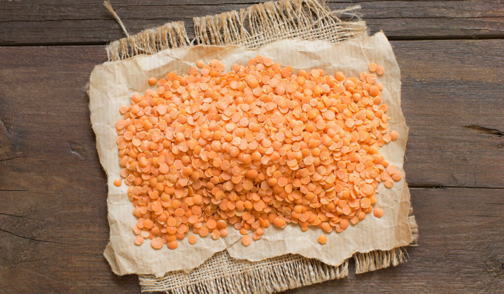 Red lentils on the table 