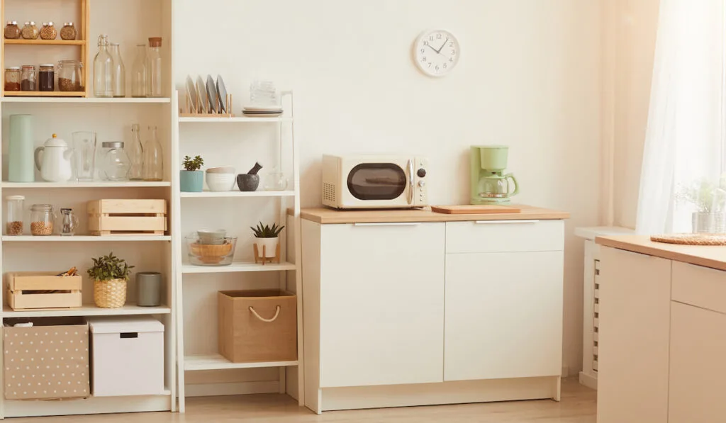 Warm Toned Kitchen Interior oven near pantry 