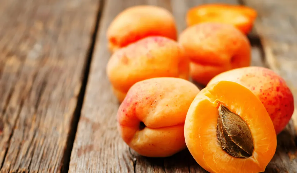 apricots on wooden table