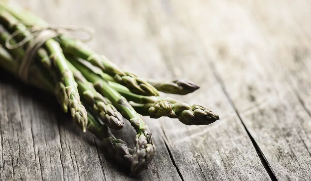 asparagus on wooden table