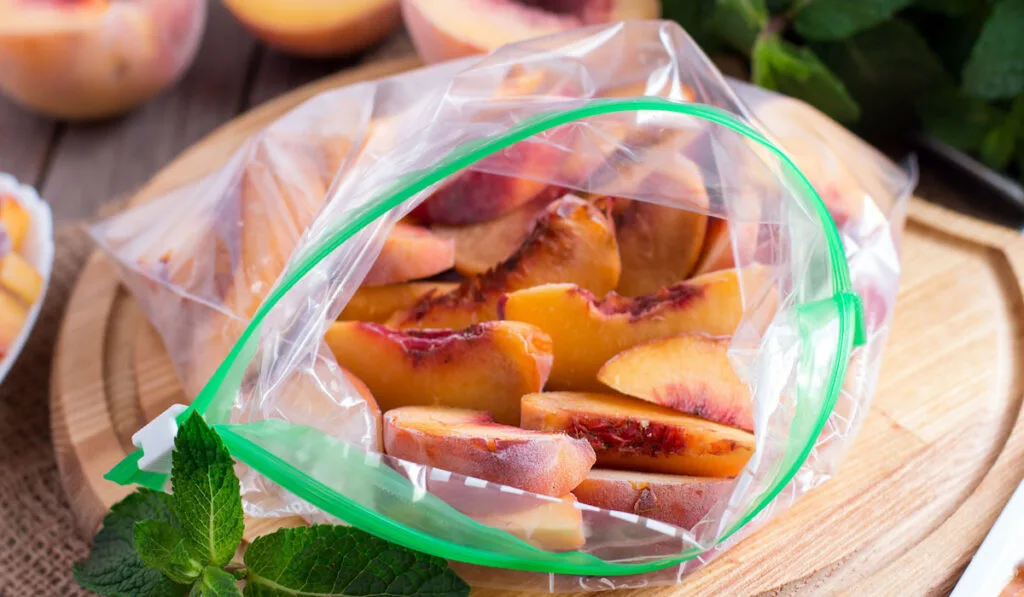 frozen peaches on airtight freezer bag