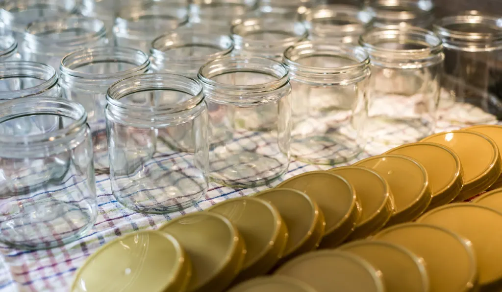 mason jars with lids on the table 