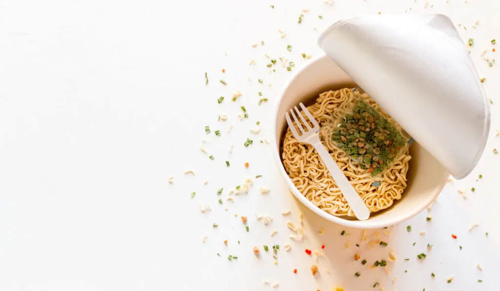 instant ramen noodles in pack on white background