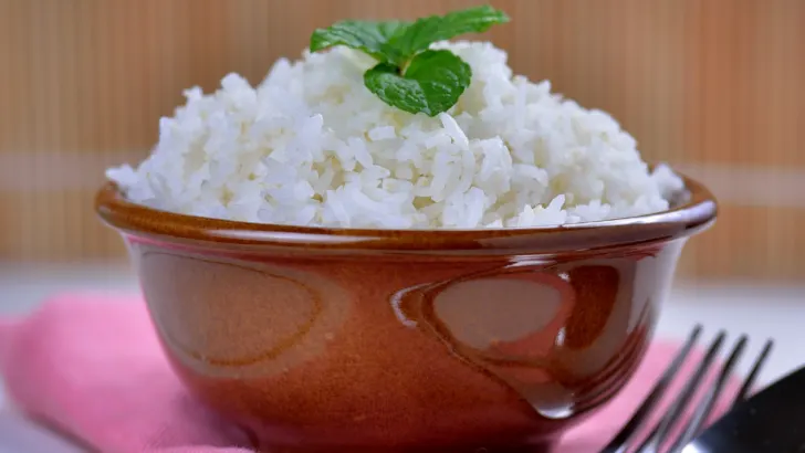 Cooked white rice garnished with mint