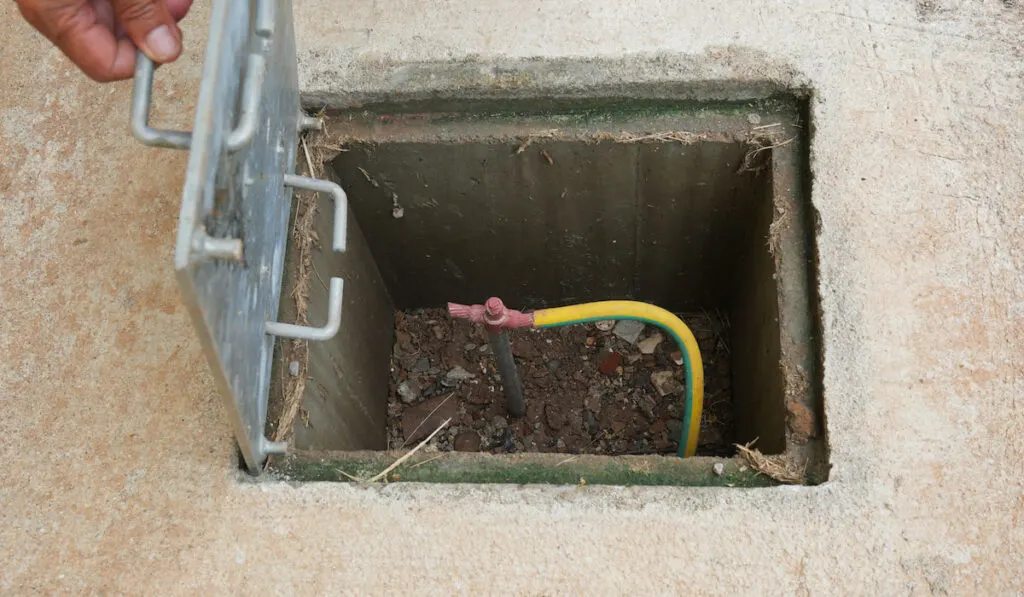 Open ground cover, welding copper ground wire on ground rod