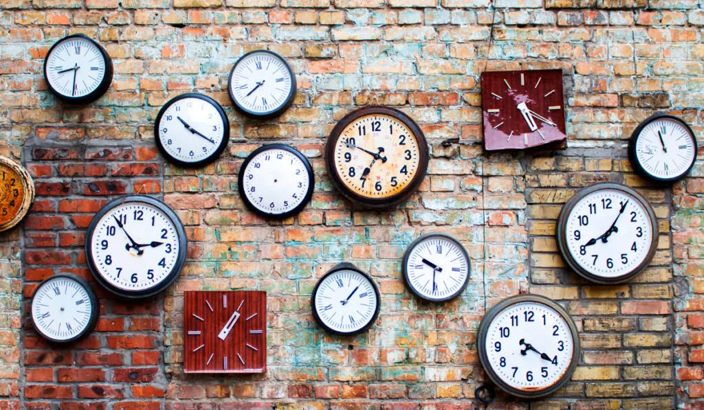collection of old clock on the wall