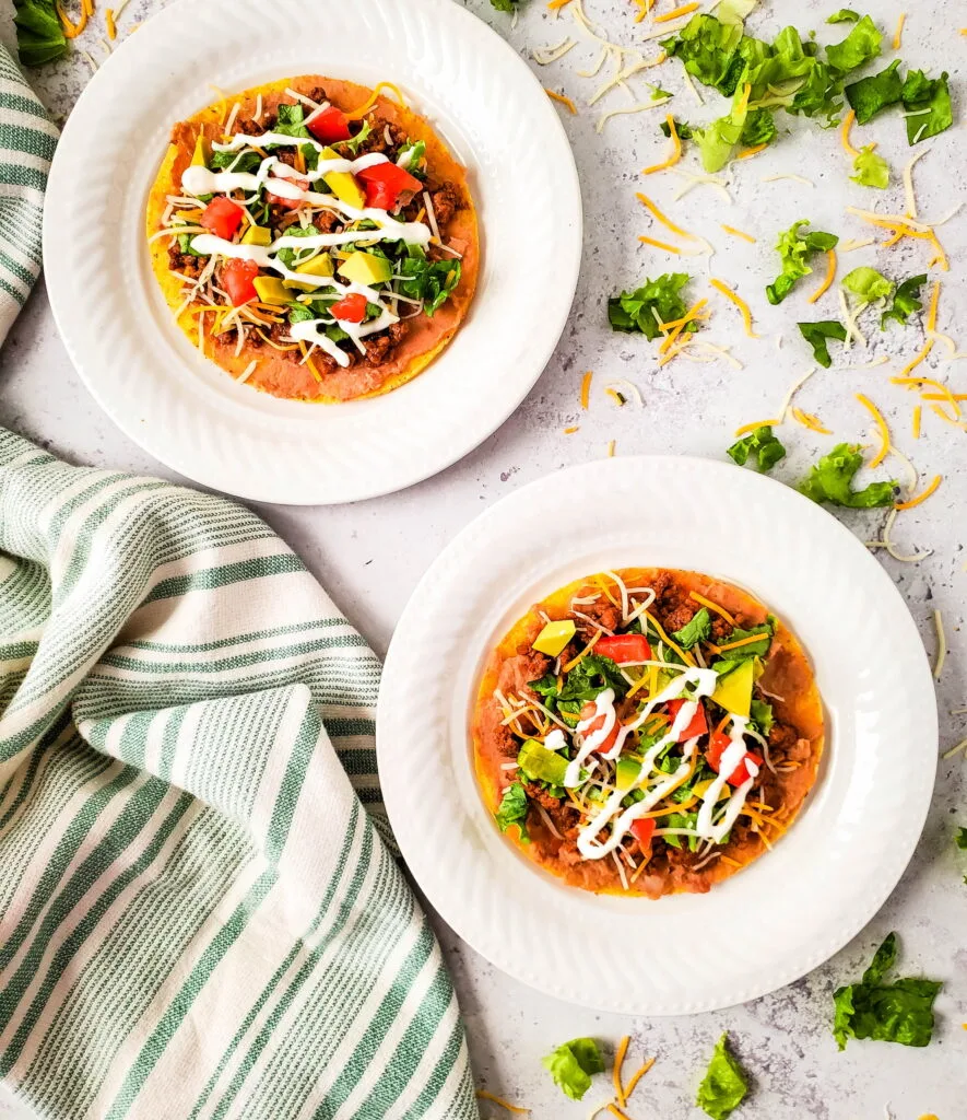 Bean and Beef Tostadas on 2 white bowls