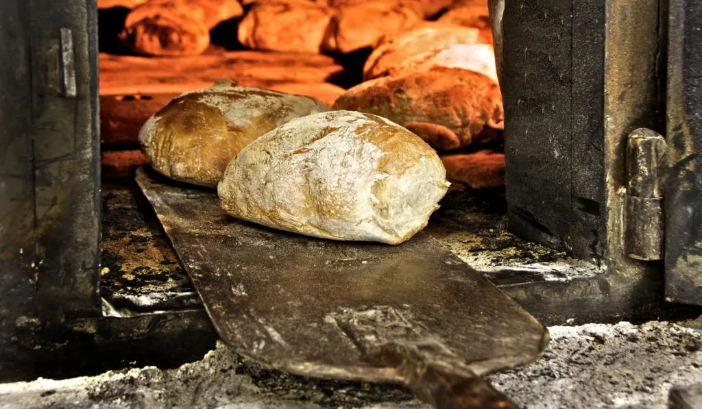 Bread freshly made Out of a traditional brick oven
