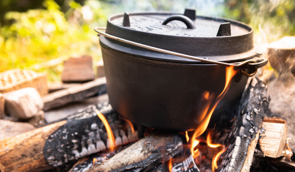 Dutch oven cooking on a campfire
