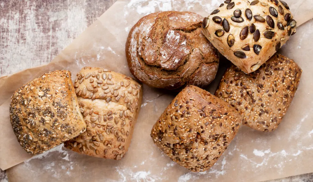 Freshly baked bread on dark gray kitchen table