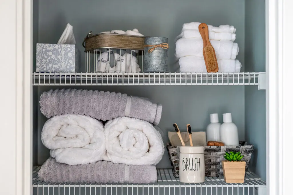 maintained organized bathroom shelves