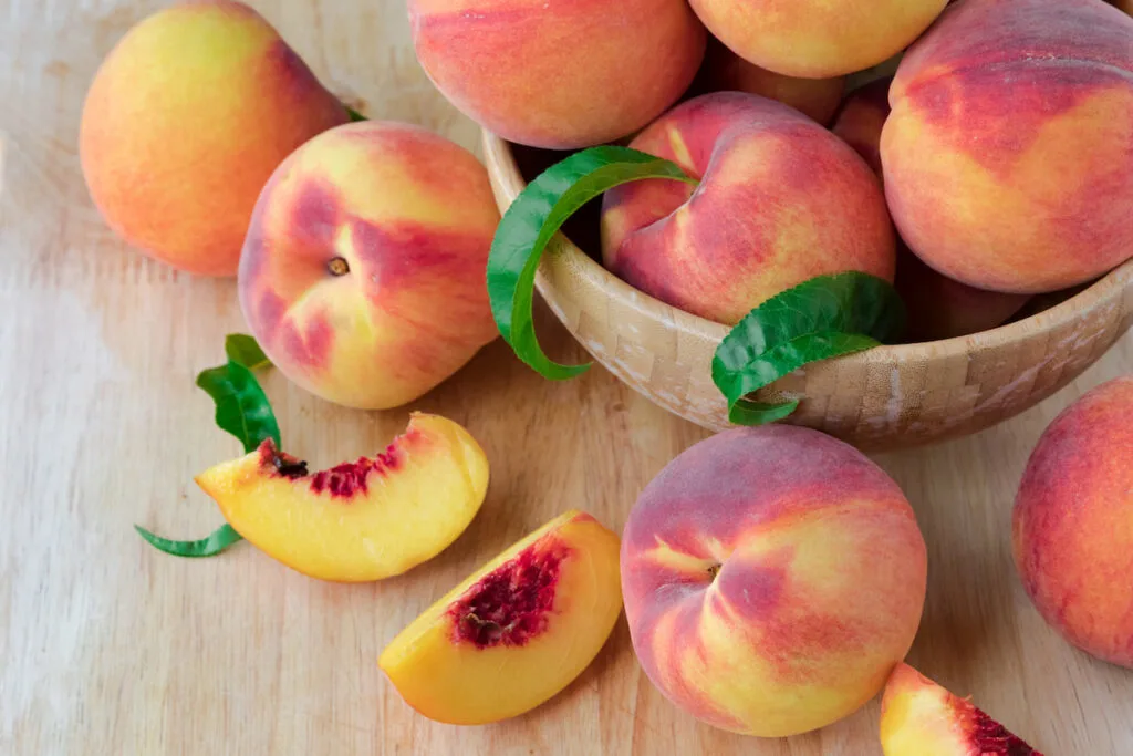 peach fruits on top of the table 