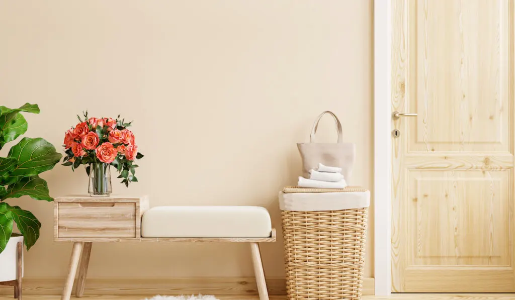 Door storage bench with cream colored wall