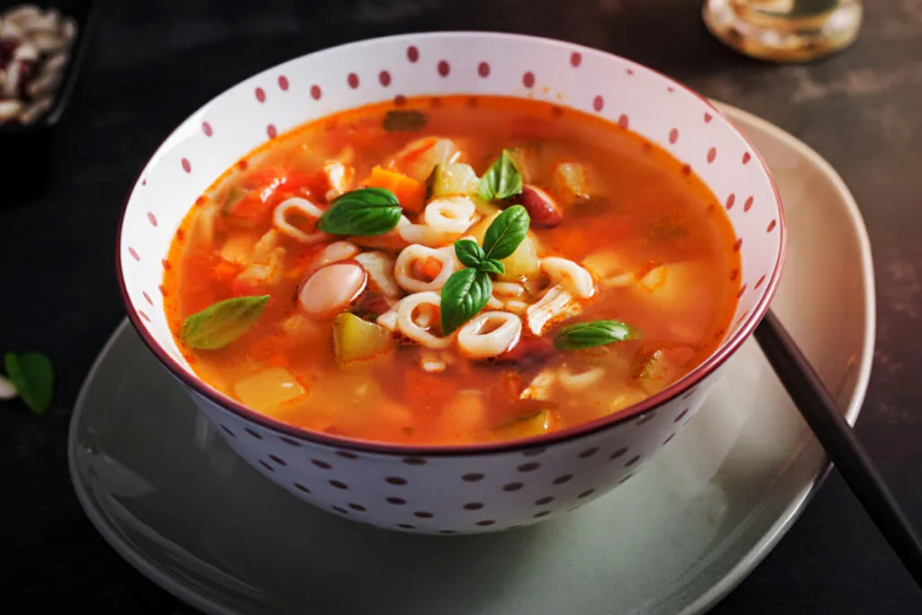 Minestrone Soup in a white dotted bowl