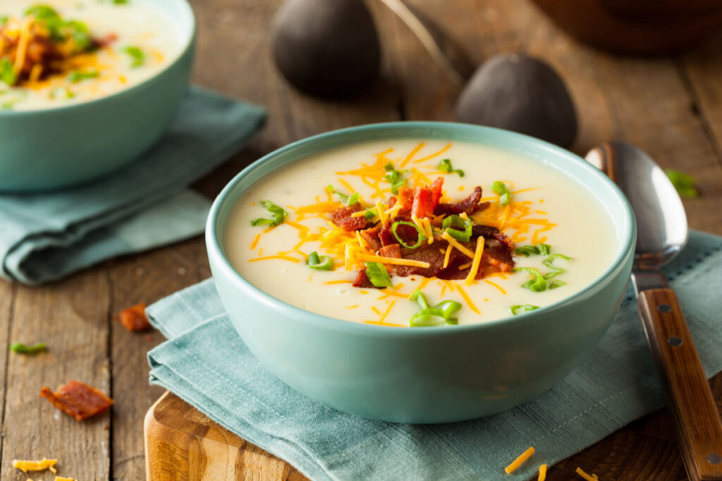 Potato soup with toppings in a bowl