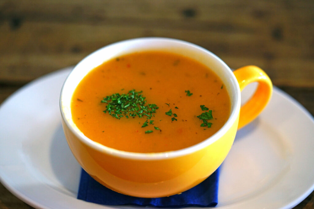 Sweet Potato Soup in an orange cup
