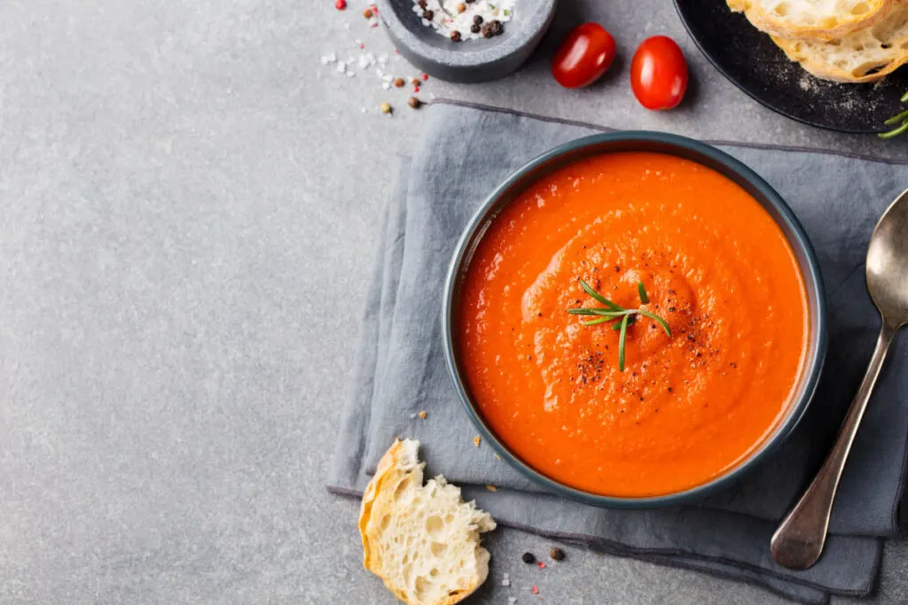 Tomato Soup in a black bowl 